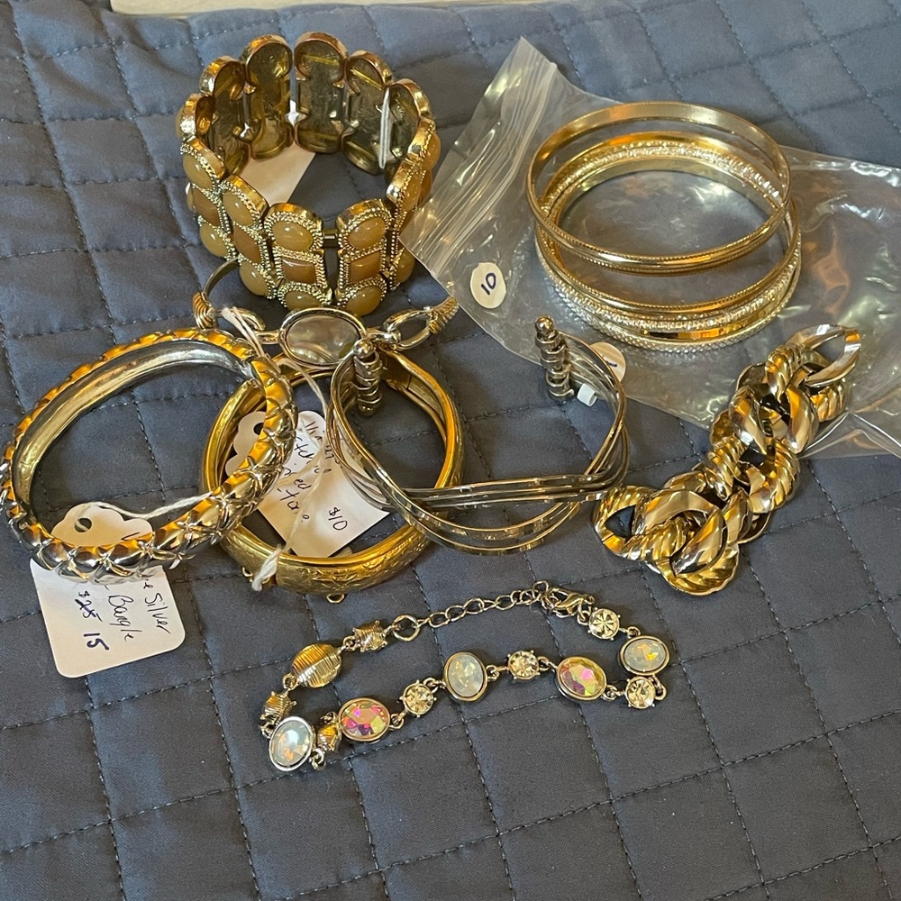 13 Gold and Silver tone Bracelets, 2 are hinged vintage. All wearable.